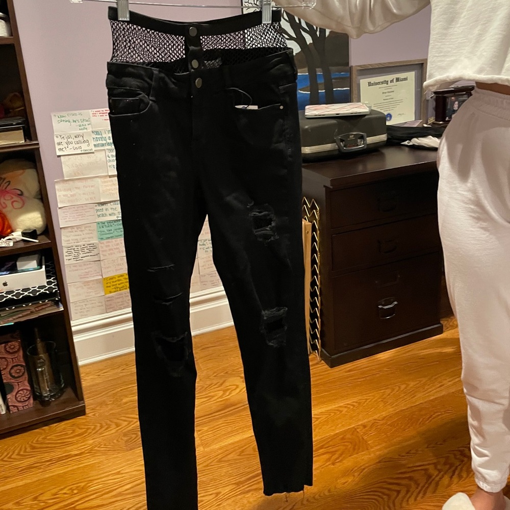 Fishnet skinny black jeans